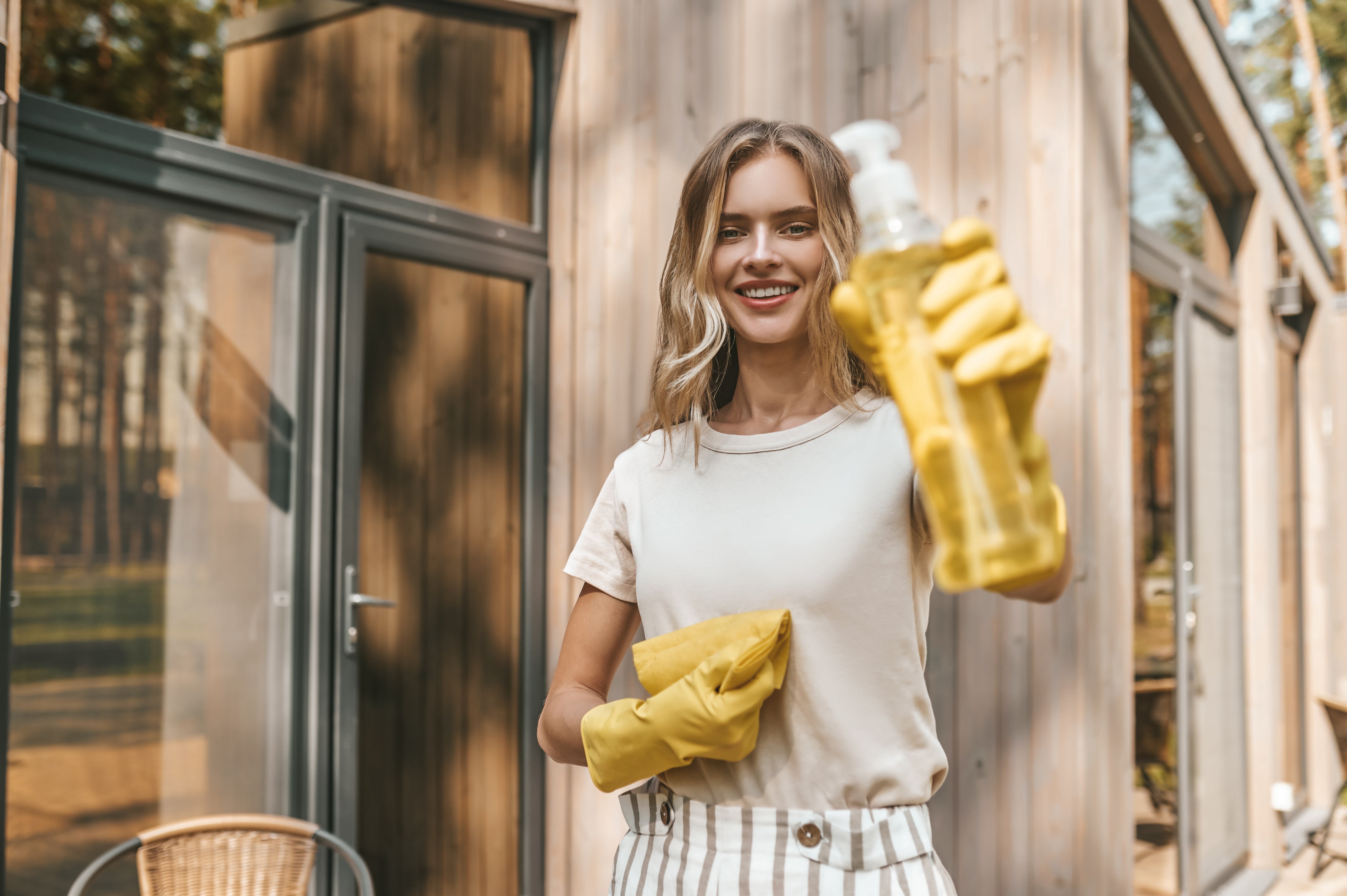 young-blonde-housewife-cleaning-house-doors.jpg